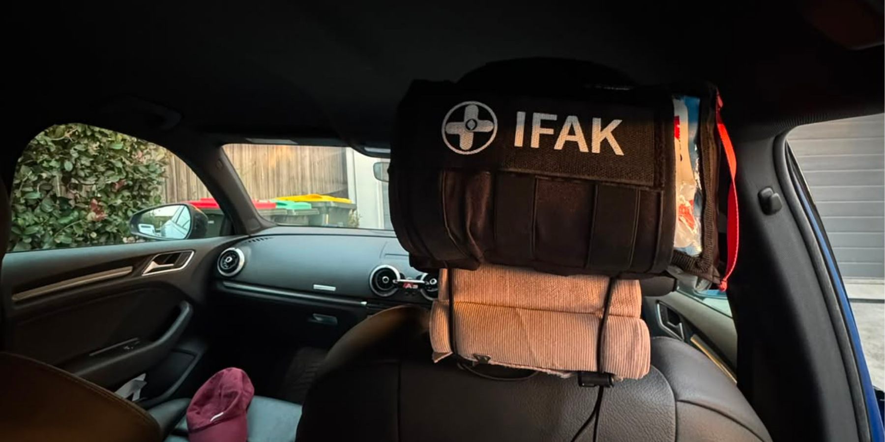 Vehicle emergency kit prepared for fast access while professional responders are on the way.