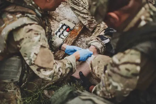 Comparison of Chitosan and Kaolin hemostatic gauze for tactical bleed control in a 2026 FlareSyn trauma kit.