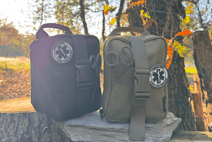 Beginner trauma kit essentials for emergencies in 2026, including tourniquet, gauze, gloves, and first aid tools